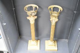 Two 19th-century brass Neoclassical-style Corinthian column candle sticks/lamp bases, featuring