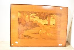 A vintage decorative marquetry wood panel, depicting a landscape scene with a central pheasant and