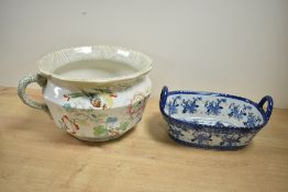 A 19th-century Masons Ironstone chamber pot, featuring colourful floral and foliate decorations with