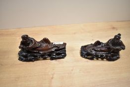 Two 19th/20th-century Chinese carved hardwood figures, possibly depicting God's, marked to base,