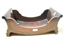 Thought to be a Georgian mahogany cheese coaster, featuring a slatted bateau design, unmarked,