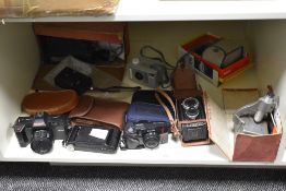 A large selection of vintage film cameras; to feature a Lubitel-2; an Olympus Superzoom 110; a