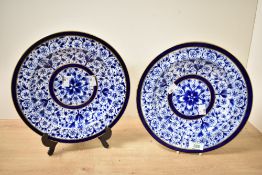 A pair of 19th-century Crown Derby porcelain 'Derby Lily' shallow plates, featuring blue floral