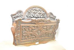 A 19th-century carved oak wall mounted letter holder, of floral and foliate decoration,
