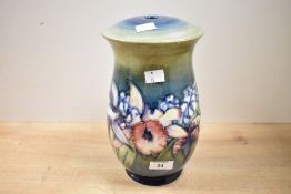 A 20th-century Moorcroft Pottery ?Orchid? lamp base, featuring colourful tube-lined large