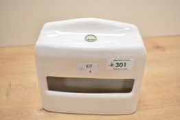 A vintage Jeyes ceramic toilet paper holder, wall mounted and designed to accomodate flat-pack Jeyes