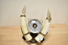 Late 20th-century Shortland Smiths Viking-style barometer, featuring a central circular aneroid