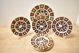 A quantity of 20th-century Royal Crown Derby bone china 'Old Imari' (1128 pattern) plates, featuring