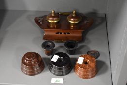 A selection of 20th-century Bakelite desktop wares, to include two GadeWare pen holders and a