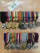 Miniature medals, two unnamed groups mounted as worn, the first group of nine on metal pin bar