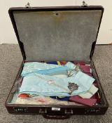 Masonic interest, a brown leather suitcase 10cm x 45cm x 34cm containing a quantity of Masonic