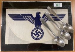WW2-period Third Reich Kriegsmarine Sports Vest Eagle badge, blue on white background above a