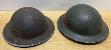 WW2-period British MK II Brodie steel combat helmet, rivet to crown, rounded edge, having red and