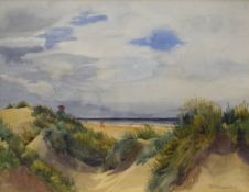 F.M Knowles (19th Century) Watercolour, a beach scene with figure in red hat amongst sand dunes,