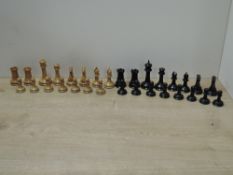 Jacques Staunton chess set, early 20th century, boxwood and ebony pieces with weighted bases, 31