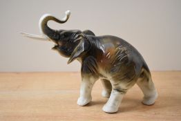 A Royal Dux bone china elephant study, bearing stamp '378 and 927' to underside but no pink