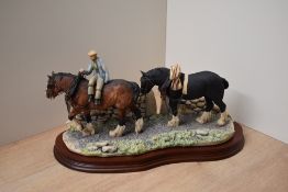 A Border Fine Arts figure group 'Coming Home' model number JH9A, designed by Judy Boyt, raised on