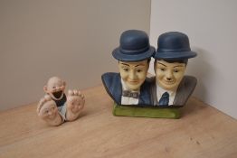 A Schafer & Vater bisque porcelain 'Happy Feet' novelty match holder sold together with a 20th