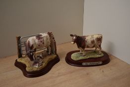 A Border Fine Arts animal group 'Clover's New Calf' model number A6519, designed by Kerry Bell