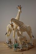 A large Country Artists Giraffe group 'Family Unit' model number CA06291, measuring 40cm tall.