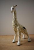 A W.R. Midwinter Burslem English pottery giraffe study, marking to side, measures 29cm tall.