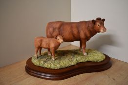 A limited edition Border Fine Arts animal group 'Limousin Cow & Calf' model number L157, designed by