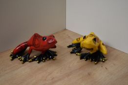 In the style of Tim 'The Frogman' Cotterill (British b.1950) a pair of large resin frog studies,
