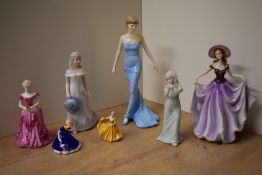 A group of three Royal Doulton bone china figurines comprising 'Diana Princess of Wales' HN 5061, '