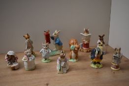 A group of eleven Royal Albert bone china and Beswick Pottery Beatrix potter characters to