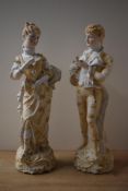 A pair of thought to be 19th century German bisque porcelain figures, depicting a lady and gentlemen