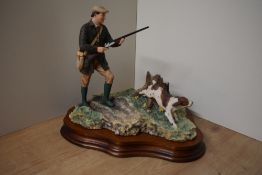A Border Fine Arts figure group 'On the Shoot', model number unknown, designed by Ray Ayres, on