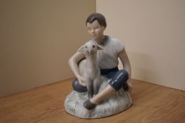 A Royal Copenhagen porcelain figurine 'Girl with Happy Lamb' model number 2336 measures 13.5cm