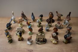 A miscellaneous assortment of Beswick pottery and similar studies to include Nuthatch model number