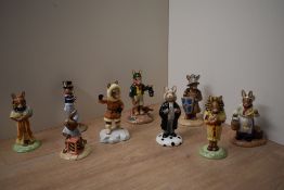 A group of nine Royal Doulton bone china Bunnykins characters to include 'Lawyer Bunnykins' model