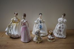 A group of three Royal Doulton bone china comprising 'Natalie' HN 3173, 'Kelly' HN 2478 and '