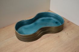 A Beswick Pottery dish, formed as a pond, model number 1989, measures 31cm approximately.