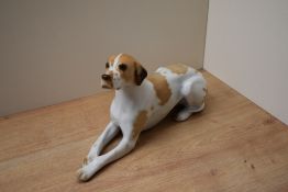 A large USSR Lomonosov porcelain pointer study, marked to underneath, measures 29cm x 16cm.