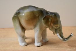 A Royal Dux bone china elephant study, bearing stamp '672 and 45' to underside with pink triangle,