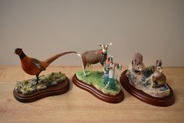 A group of three Border Fine Arts animal groups comprising 'Prize Blossoms' model number A0458