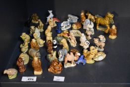 A selection of English Pottery Wade 'Whimsies' to include panda, camel, hippopotamus, hare and