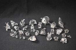 A group of thirty Swarovski Crystal animal studies to include cat, turtle, squirrel, pigs, kangaroo,