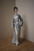 A Royal Doulton bone china figurine 'Boudoir' HN 2542, measuring 31cm tall.