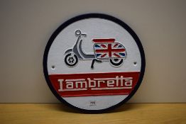 A painted cast Lambretta wall plaque 29cm