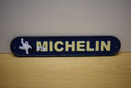 A cast Michelin sign