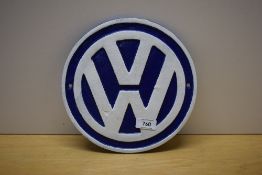 A circular painted cast VW sign 23cm
