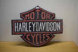 A Harley Davidson Cycles sign 61cm wide