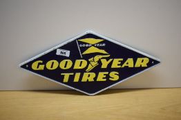 A diamond shaped Goodyear Tyres cast sign