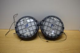 A pair of Hella spot lights