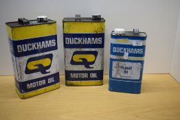Three vintage Duckhams oil cans
