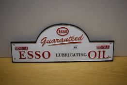 An Esso Lubricating Oil cast sign